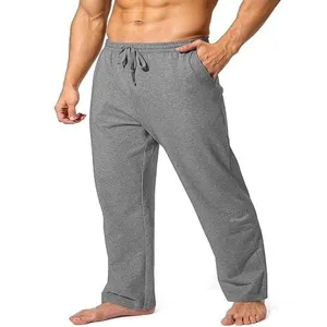 Vista dettagliata dei pantaloni casual grigi da uomo con coulisse elastica e comode tasche.