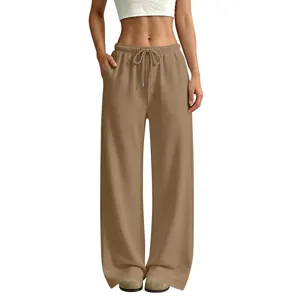 Detailed view of women's casual fleece lined loose straight leg sweatpants in khaki color.