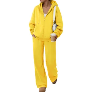 Detailed view of women casual yellow fleece zip hoodie and wide leg sweatpants tracksuit set.