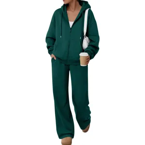 Detailed view of the dark green fleece zip up hoodie and wide leg pants tracksuit.