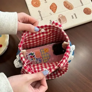 Detail view of Korean sweet checkered mini handbag showing interior structure and lace trim.