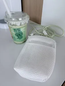White mesh crossbody phone bag minimal style portable small pouch with green strap daily use
