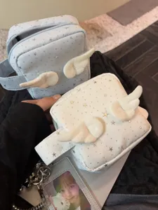 Detailed view of cute star plush angel wings small square makeup bag for daily storage.