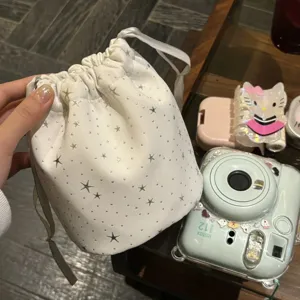 White sparkly star drawstring storage pouch for instax camera cosmetics and daily accessories main view