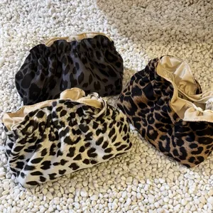 Leopard print cosmetic bag portable travel makeup pouch stylish evening clutch storage bag.