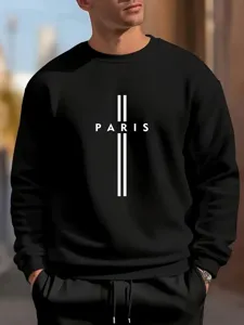 Detailed view of black crewneck sweatshirt featuring white Paris letter cross print.