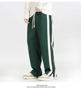 Men's loose casual straight leg trousers with side stripes and drawstring waist detail.