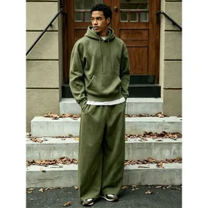Detailed view of casual fleece-lined hoodie and wide-leg pants set in solid olive green.