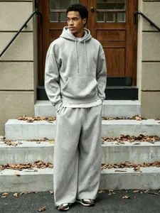 Men's casual solid fleece sports suit, hooded sweatshirt and wide-leg pants detail view.