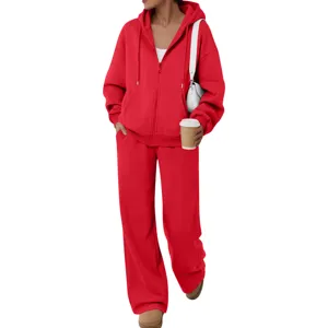 Detail shot of a vibrant red fleece zip hoodie and matching wide leg sweatpants set.