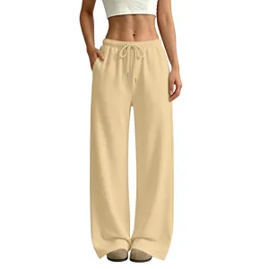 Close-up detail view of women's casual wide leg sweatpants featuring drawstring waist and pockets