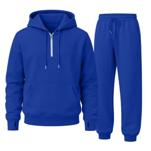 Detail view of royal blue zip hoodie and sweatpants set, comfortable casual wear.