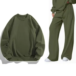 Solid color long sleeve crewneck sweatshirt and wide-leg sweatpants casual tracksuit set.