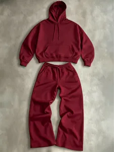 Burgundy oversized hoodie and wide-leg sweatpants set, casual streetwear detail view.
