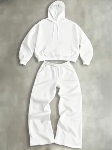 Detailed view of the casual white hoodie and wide-leg sweatpants set, comfortable style.