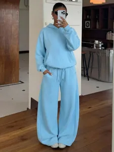 Casual fleece hoodie and wide leg sweatpants two piece set in light blue color for women.