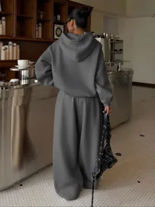 Women's casual fleece hoodie and wide leg sweatpants two piece set apparel detail.