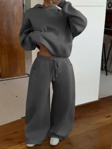 Casual fleece hoodie and sweatpants set for women, comfortable two-piece streetwear.