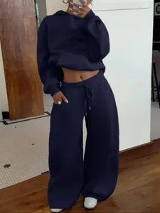 Detail view of women casual fleece hoodie and wide leg sweatpants lounge set in navy blue.