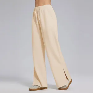 Pantalón de chándal ancho y casual para mujer con una abertura lateral elegante.