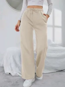Detailed look at women fleece sweatpants showing soft fabric, drawstring waist and cozy fit.