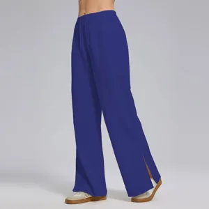 Pantalón de chándal ancho y cómodo con abertura lateral, estilo casual ideal para hombres y mujeres.