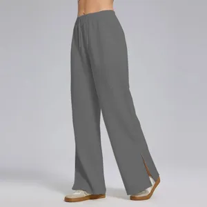 Pantalón de chándal gris con abertura dobladillo cordón cintura alta mujer sport.