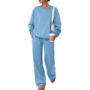 Solid color crewneck sweatshirt and sweatpants loungewear set for casual daily wear.