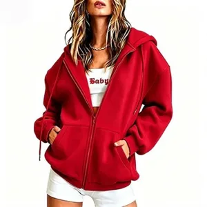 Details of the red casual fleece zip-up hooded sweatshirt showing texture, zipper, and pocket.
