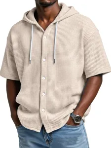 Close-up detail of the men's waffle knit short sleeve hooded shirt showcasing its texture.