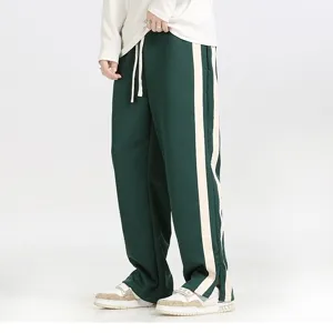 Men's loose casual wide-leg striped straight trousers with drawstring detail for daily wear.