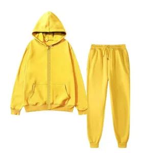 Detail shot of the bright yellow fleece zip-up hoodie and matching casual sweatpants set.