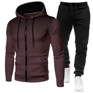 Men's and women's fleece zip hoodie and sweatpants sports tracksuit set with dot pattern.