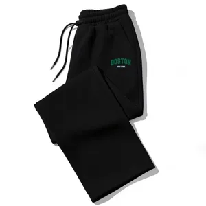 Black drawstring sweatpants with green Boston graphic print, comfortable loose fit casual jogger.
