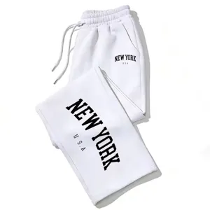 Details of white Y2K letter printed loose drawstring sweatpants, casual wide leg lounge pants.