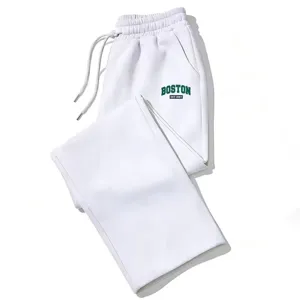 Casual white loose sweatpants with drawstring waist and green Boston collegiate print.