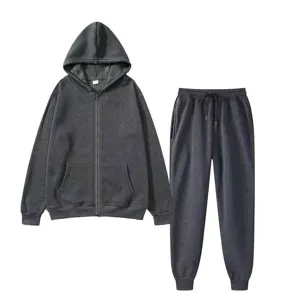 Detailed view of dark grey fleece zip-up hoodie and matching sweatpants tracksuit set.