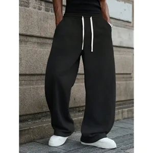 Men's casual loose streetwear sweatpants with white drawstring, comfortable wide leg fit.