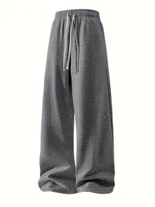 Men's loose fit casual grey sweatpants with drawstring wide leg streetwear trousers.
