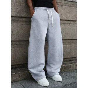 Casual grey wide-leg sweatpants for men, loose fit with drawstring waist for comfort.