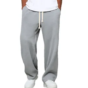 Pantalon large décontracté ample en tricot gaufré gris pour homme avec cordon de serrage