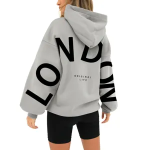 Women's casual oversized grey hoodie with dropped shoulders and stylish letter back print.