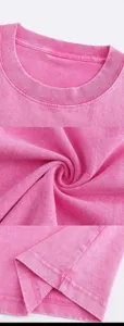 Detailed close-up of pink vintage washed cotton short sleeve t-shirt showing neckline.