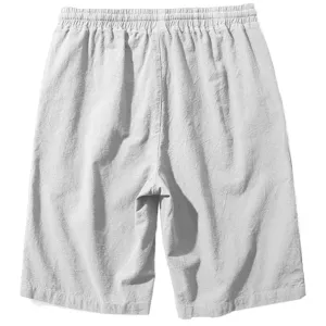 Rear view detail of casual cotton linen mens shorts in light grey color for summer beach.