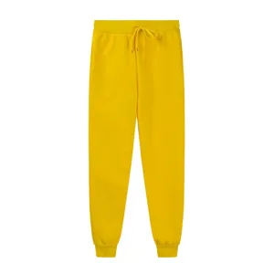 Close-up view of comfortable yellow fleece sweatpants with adjustable drawstring waistband.