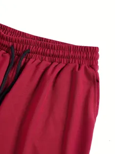 Men casual shorts waist detail, dark red fabric with black drawstring, soft and comfortable.