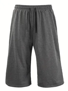 Dark grey casual loose shorts detail, featuring elastic drawstring waistband and wide-leg design.