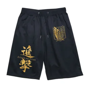 Detail view of black casual shorts featuring gold anime wings print and drawstring waist design.