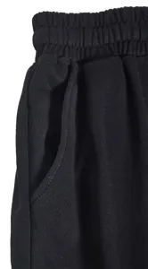 Men's casual shorts detail showing elastic waistband and side pocket craftsmanship.