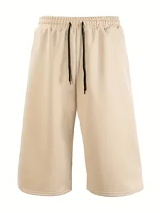 Detail view of men's casual solid color loose wide-leg capri shorts with adjustable drawstring.